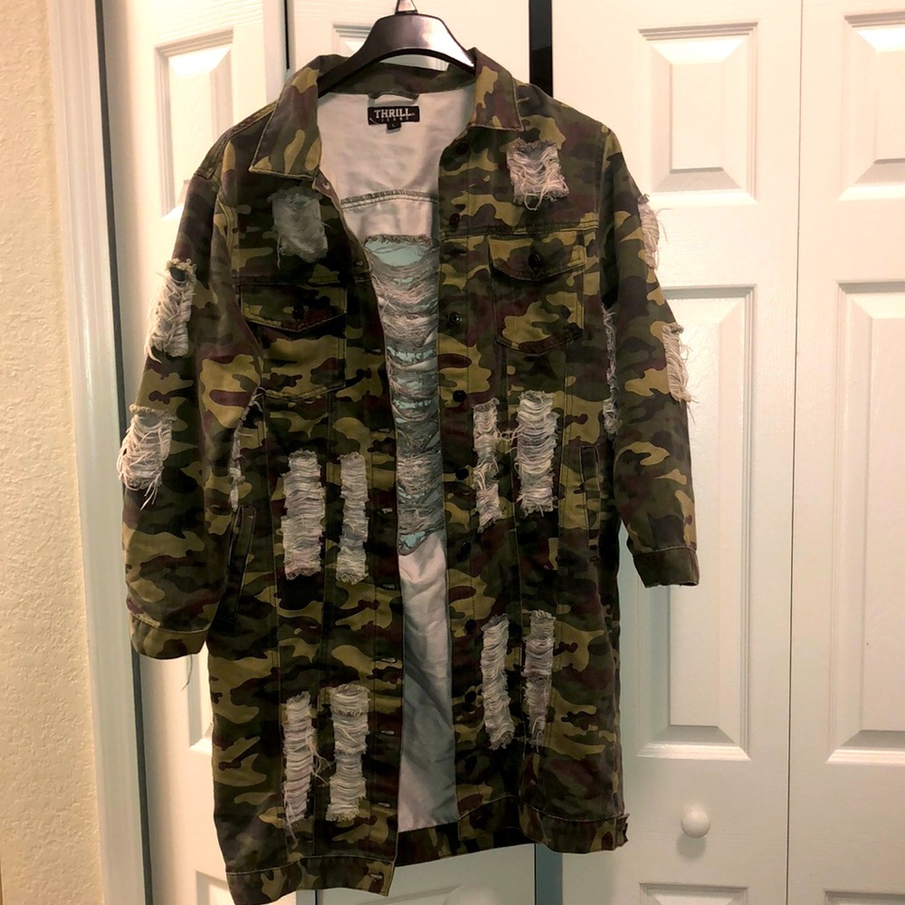 Women; oversized distressed fatigue/camo jacket. Size-large